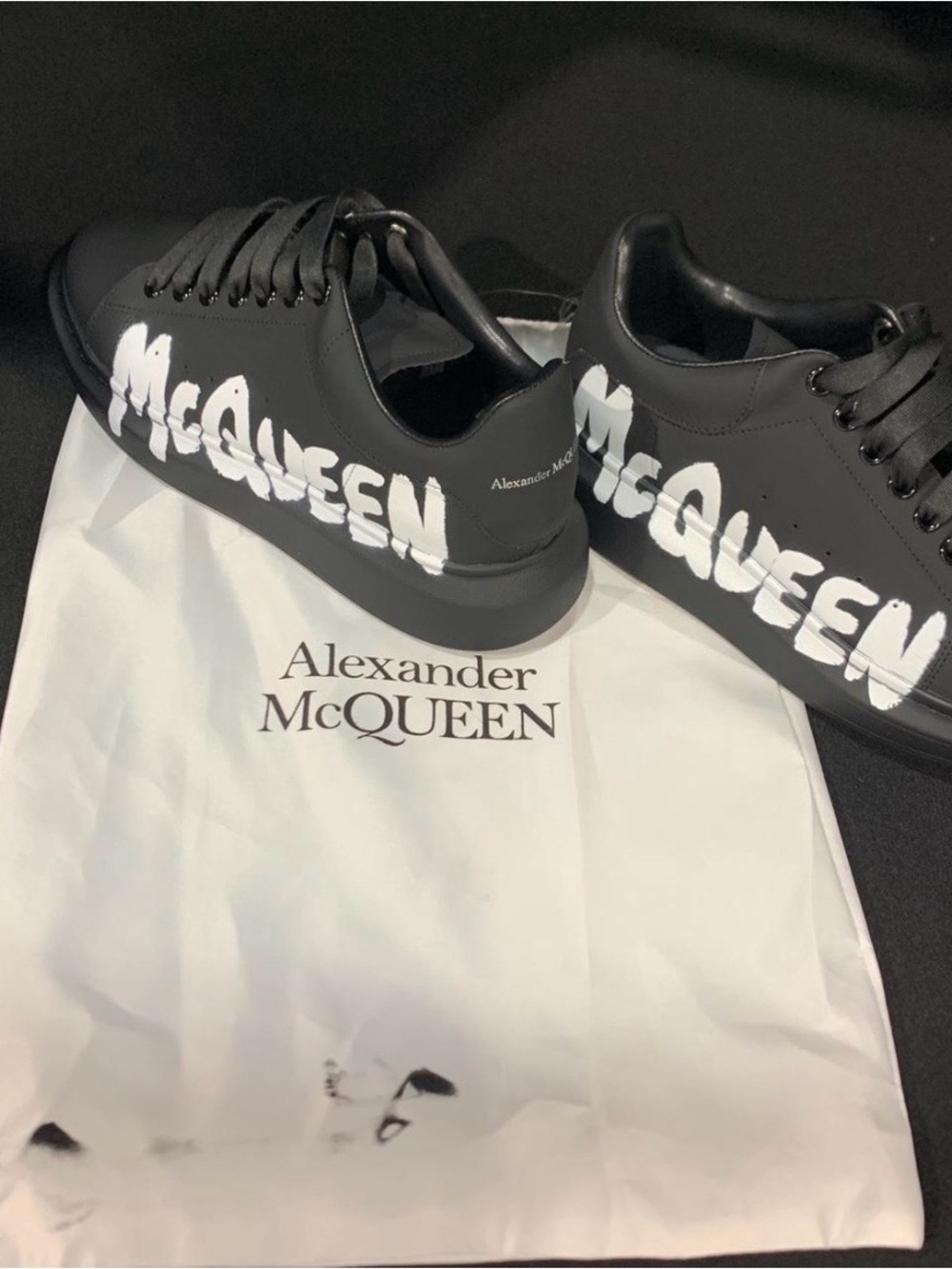 Alexander McQueen Black Leather Sneakers with White Graffiti Logo